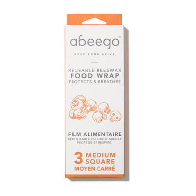 A package of three medium squares of Abeego reusable beeswax food wrap.